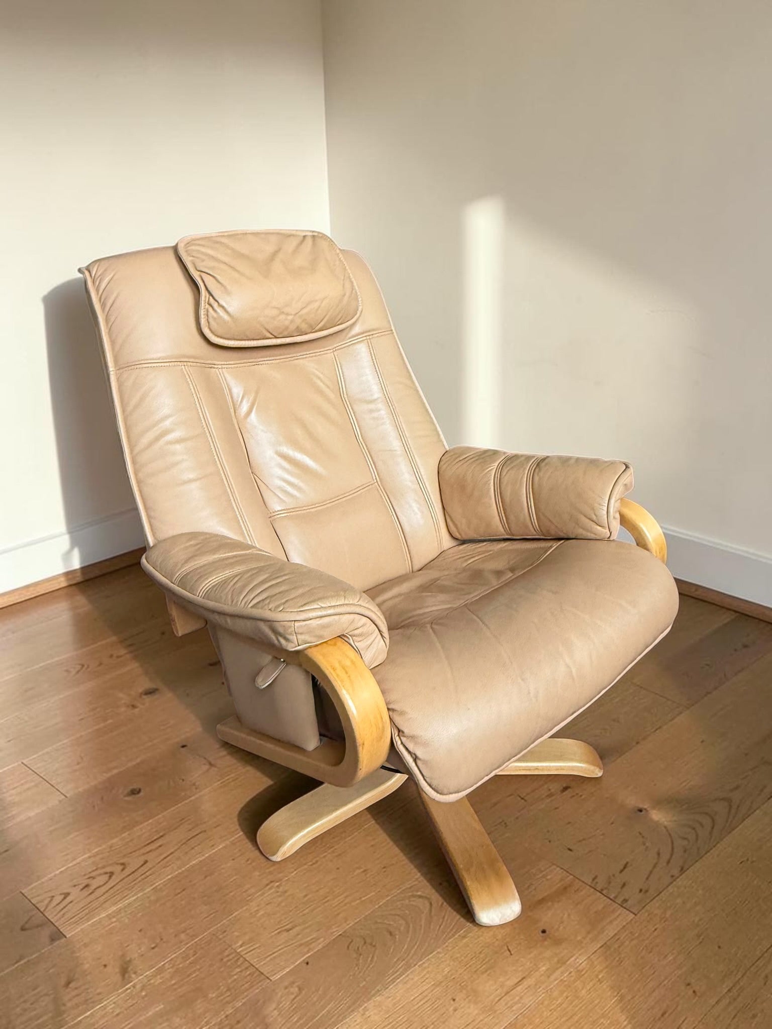 Leather lounge chair with footstool