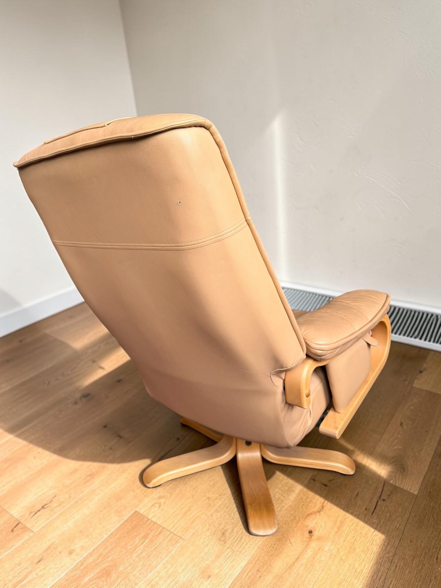 Leather lounge chair with footstool