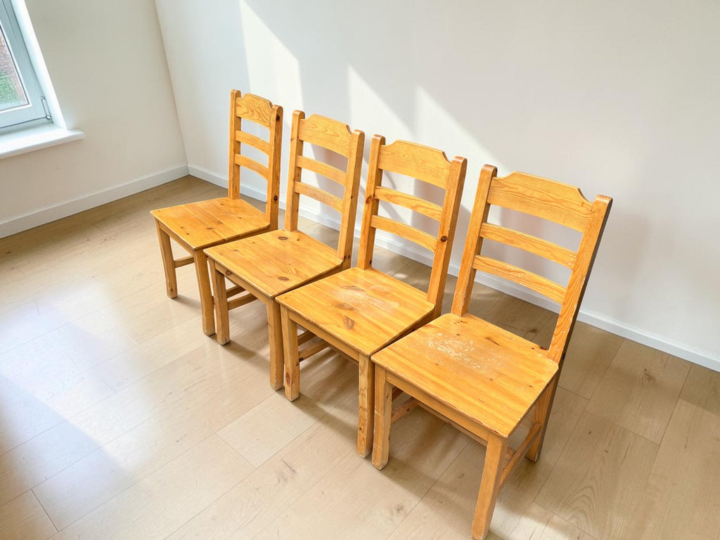 a set of 6 wooden dining chairs