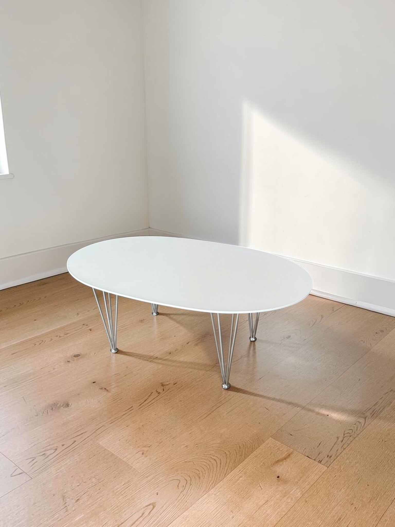 Modern Oval White Coffee Table with Chrome Wire Legs