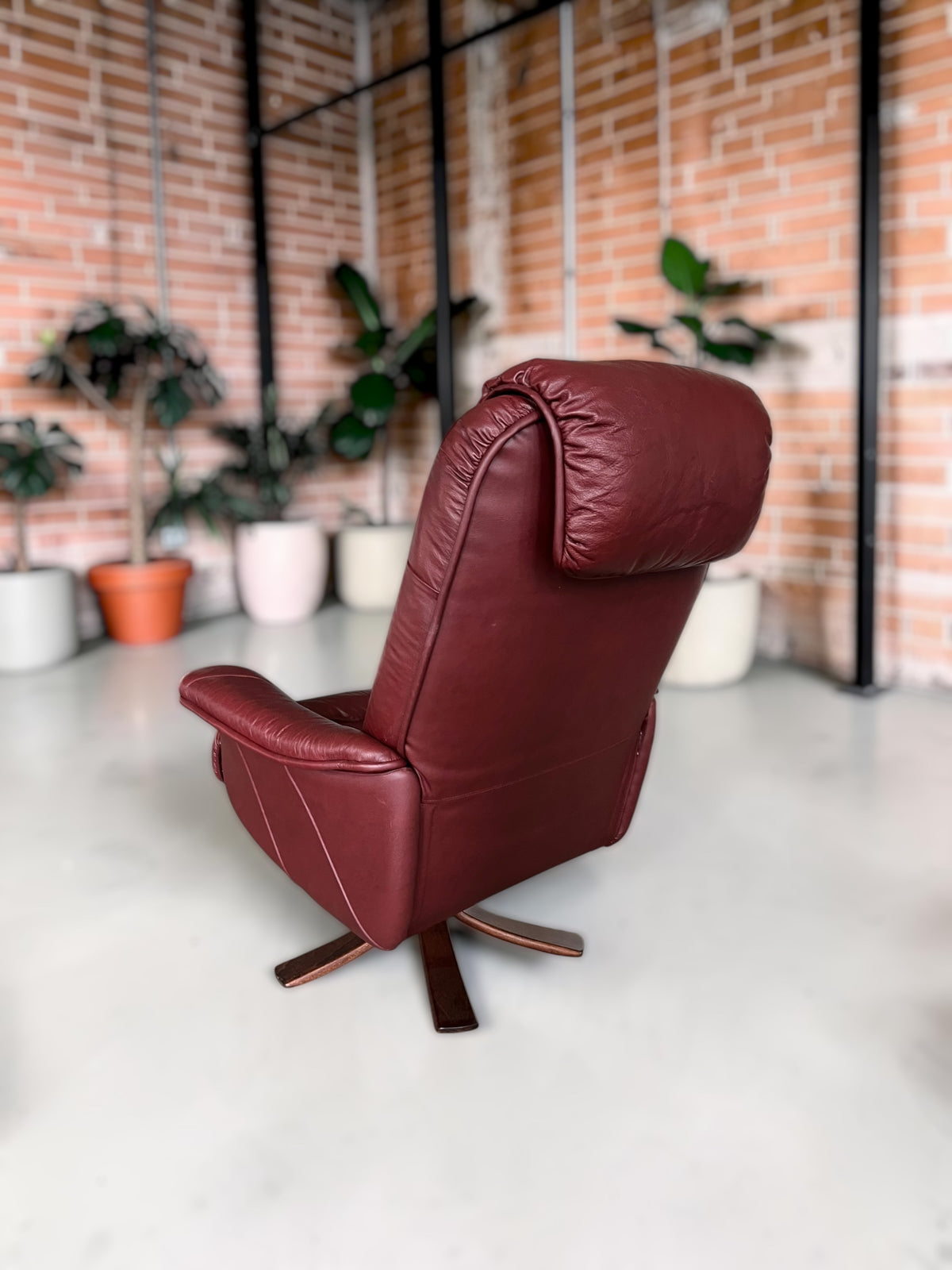 Leather lounge chair with footstool