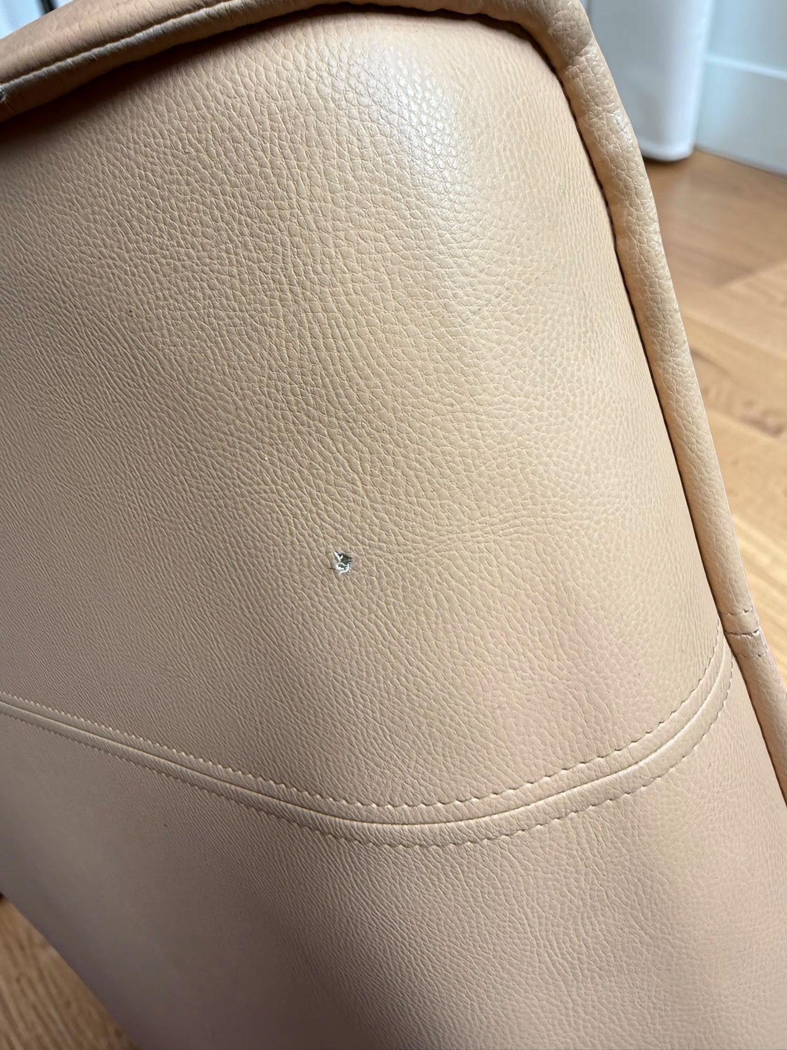 Leather lounge chair with footstool