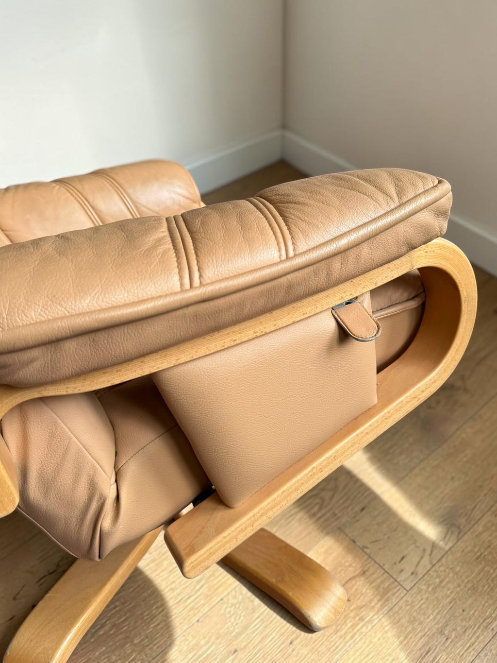 Leather lounge chair with footstool