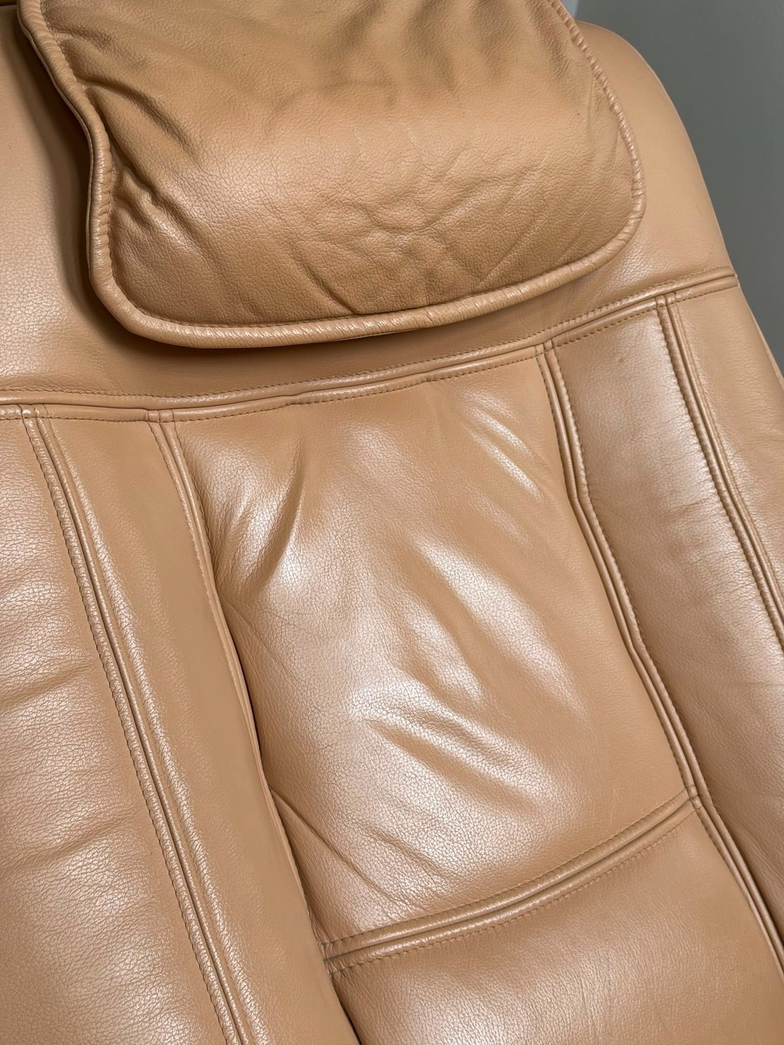 Leather lounge chair with footstool