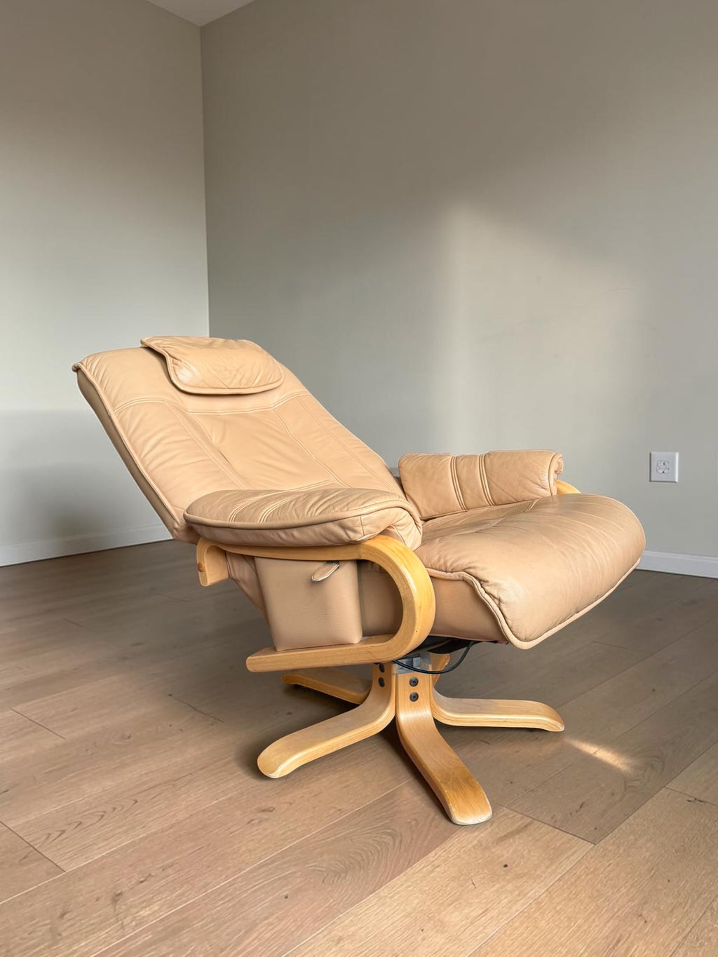 Leather lounge chair with footstool
