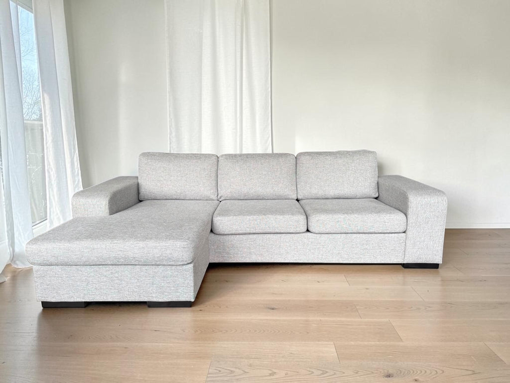 Modern light gray corner sofa