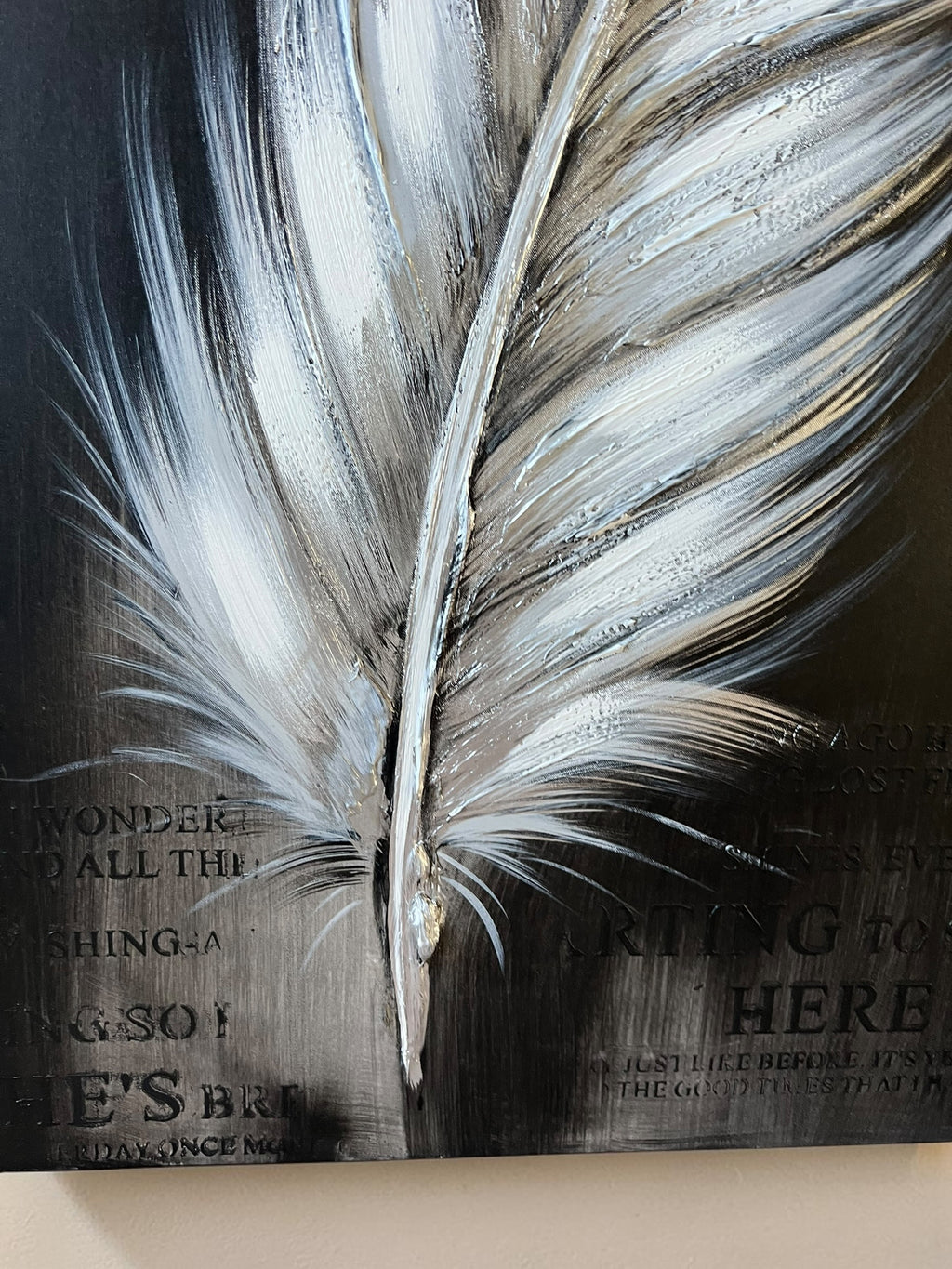 Painting featuring text and a giant feather