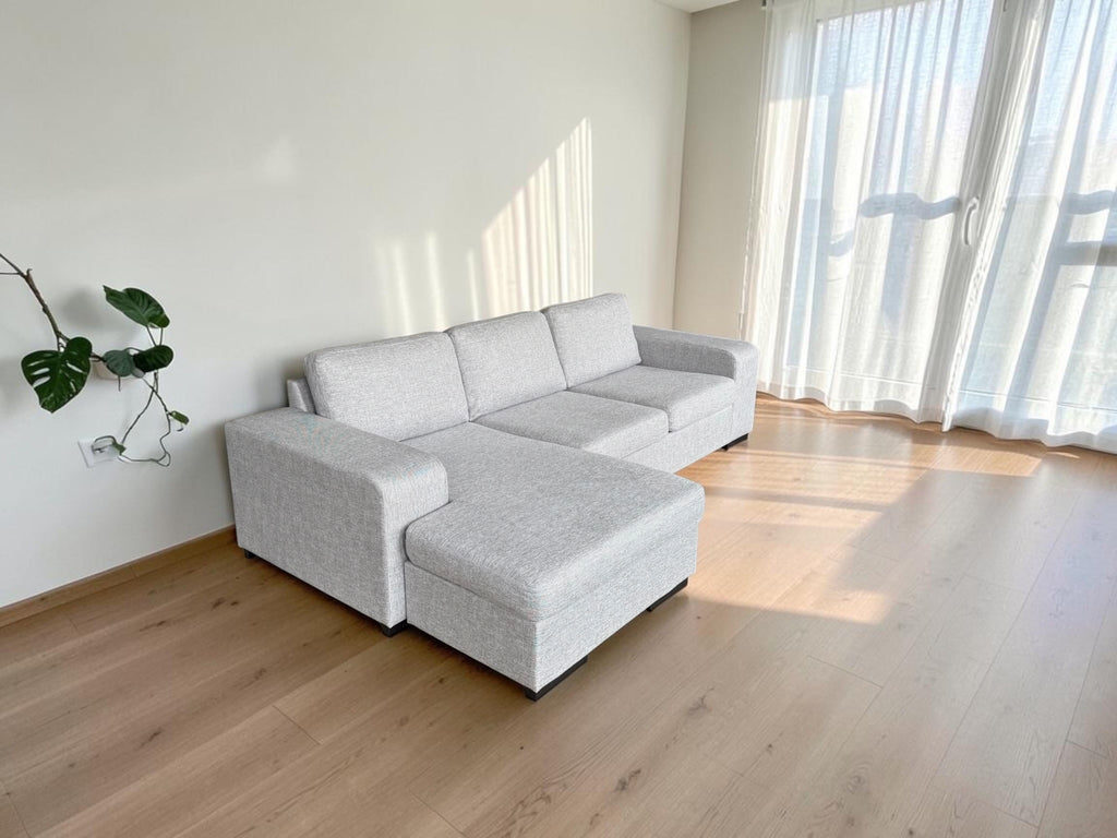 Modern light gray corner sofa