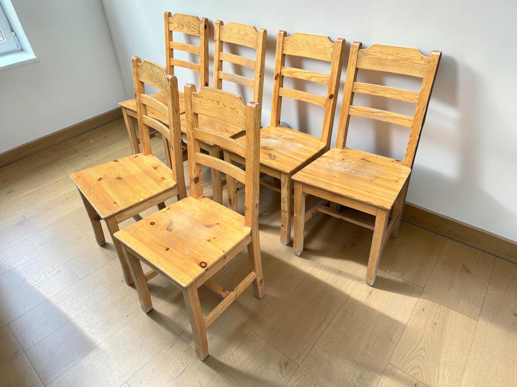 a set of 6 wooden dining chairs