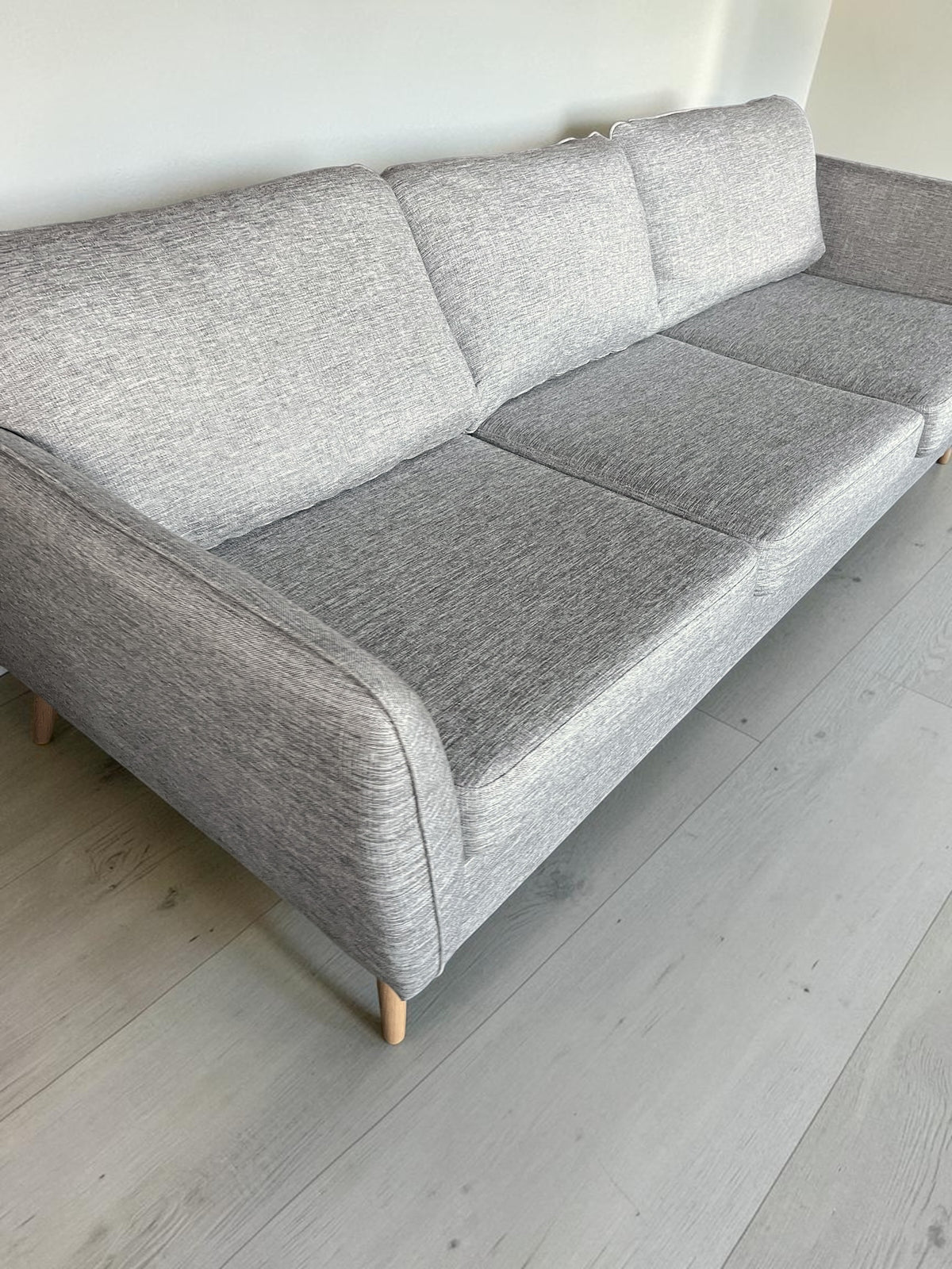 Sleek design three seater sofa