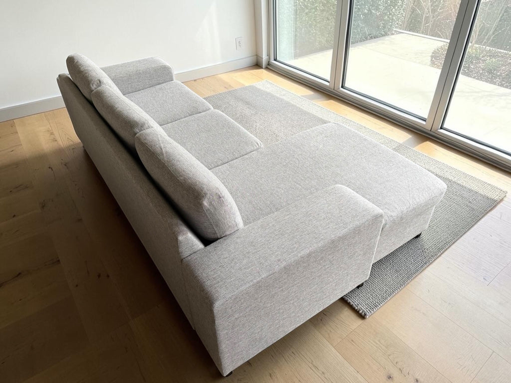 Modern light gray corner sofa