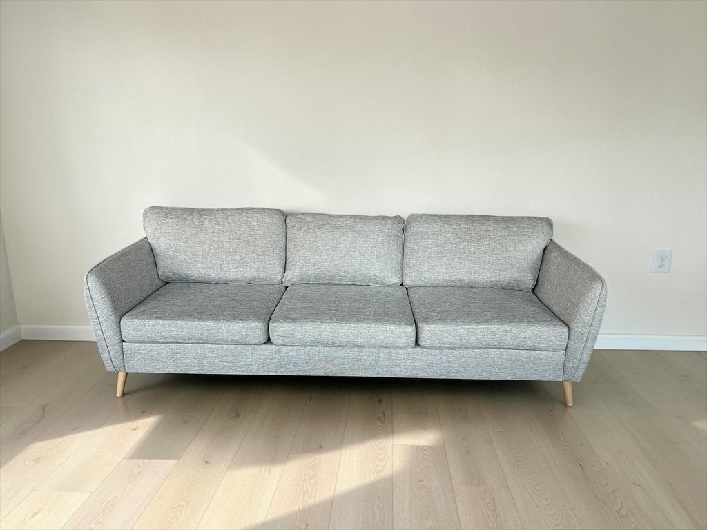 Sleek design three seater sofa