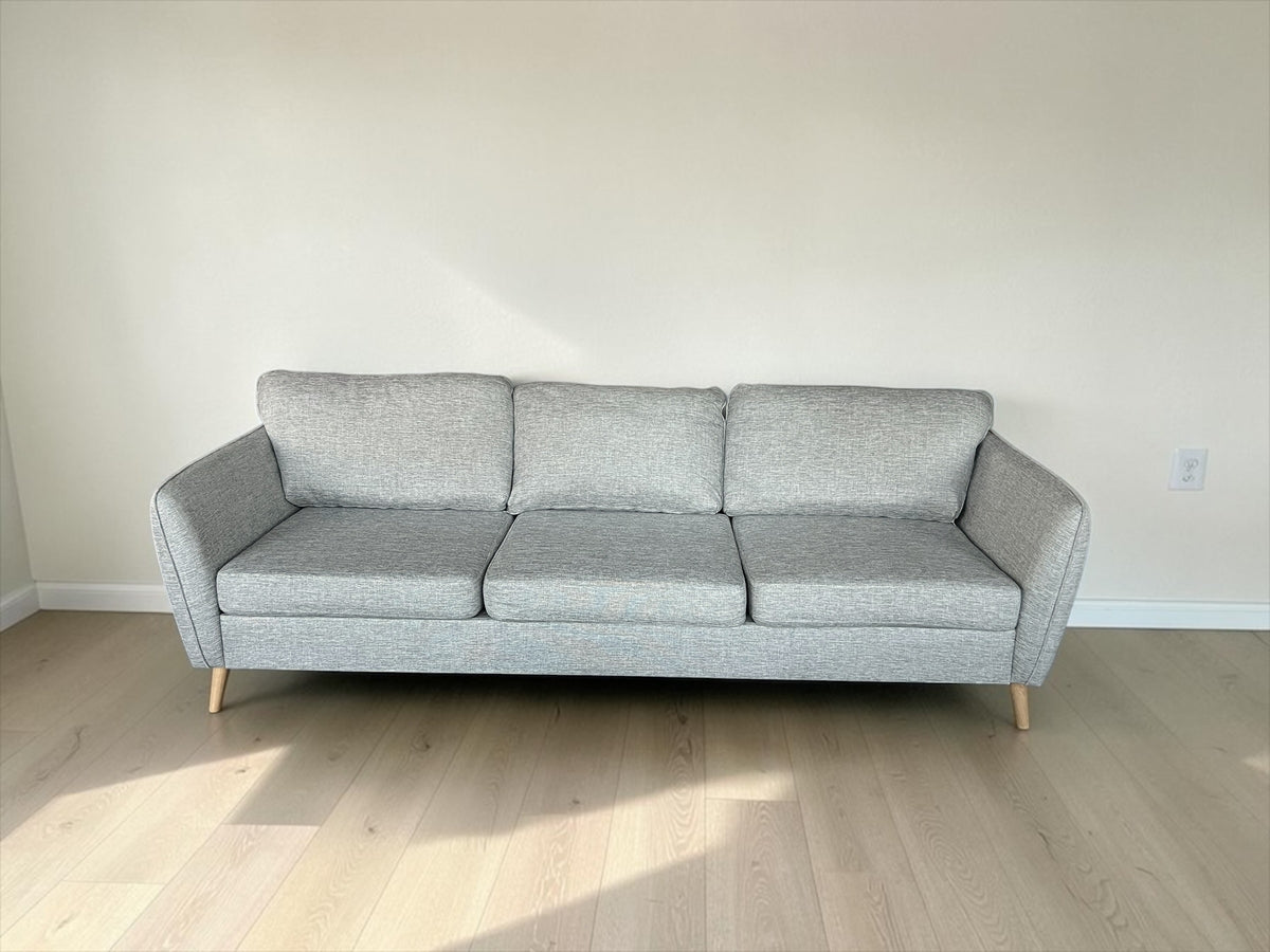 Sleek design three seater sofa