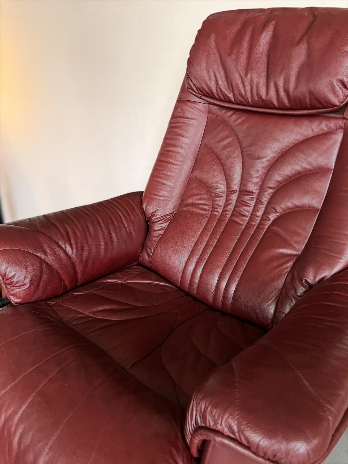 Leather lounge chair with footstool