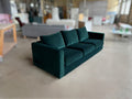 Dark green velvet sofa