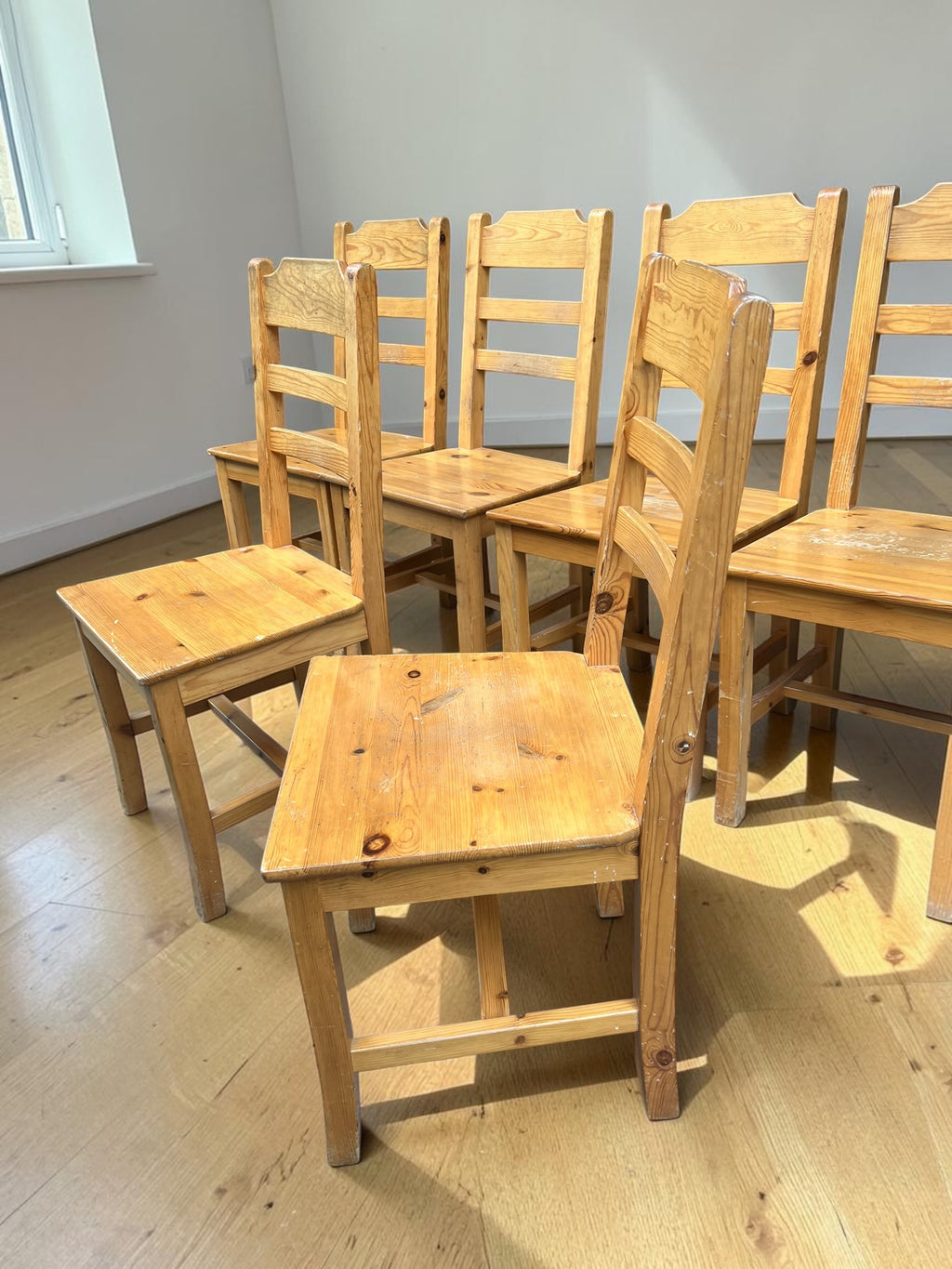 a set of 6 wooden dining chairs